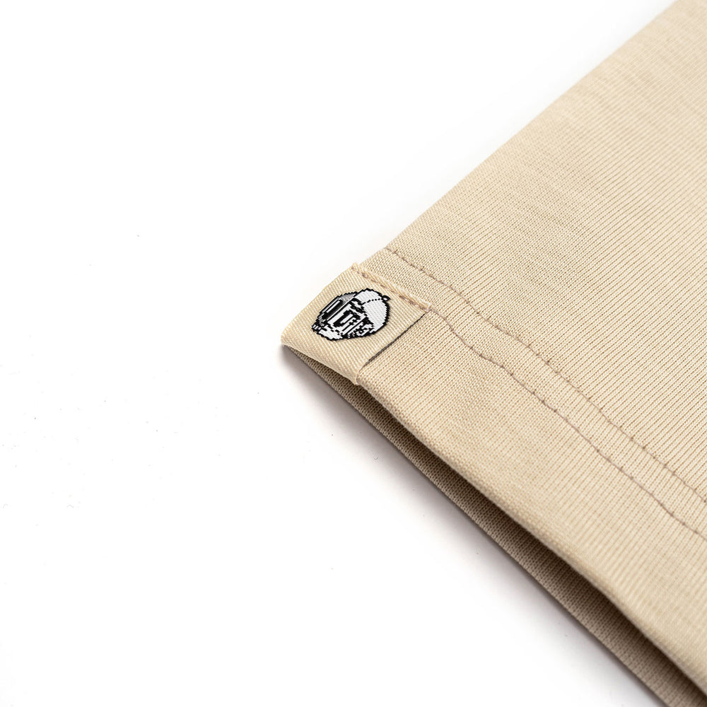 The Hatch Broad Tee (Present) – Beige